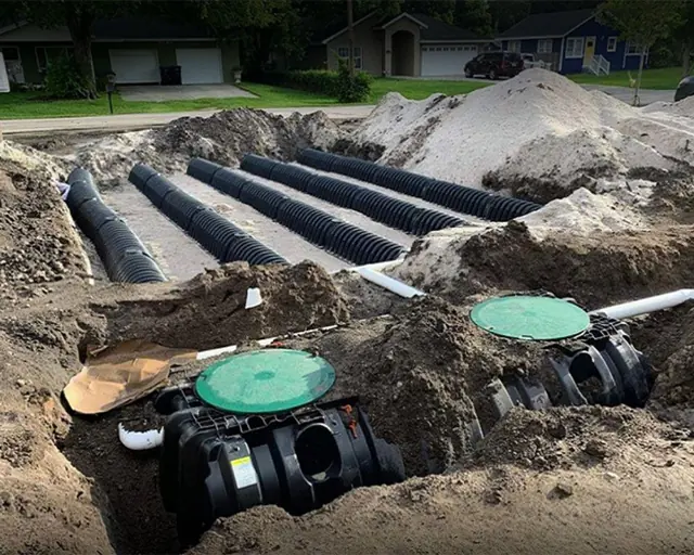 Septic tank and drain field chambers during installation