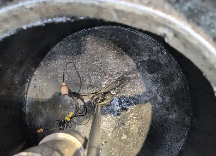 Inside the same septic tank after service, example 9 of 11