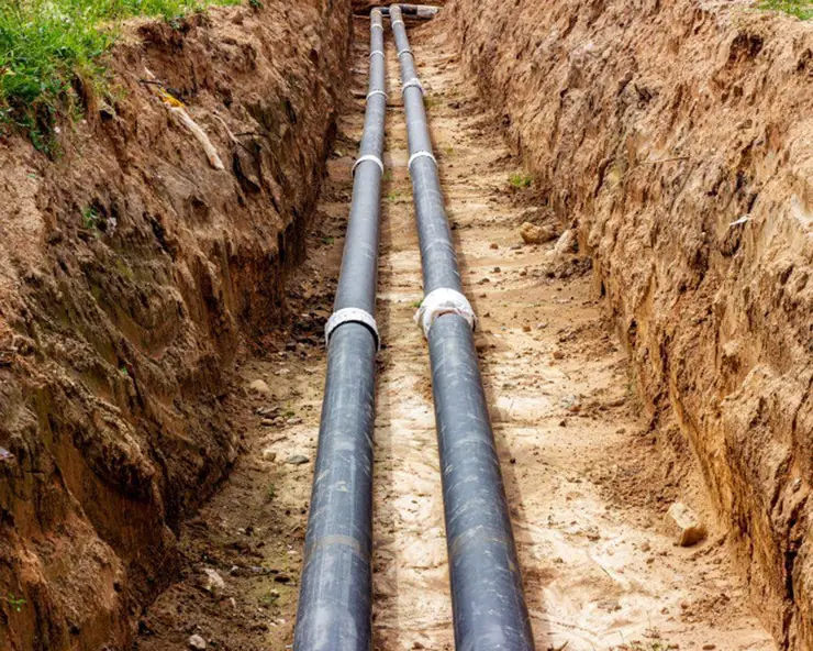 Two pipes run side by side in a trench (distribution box glossary guide)